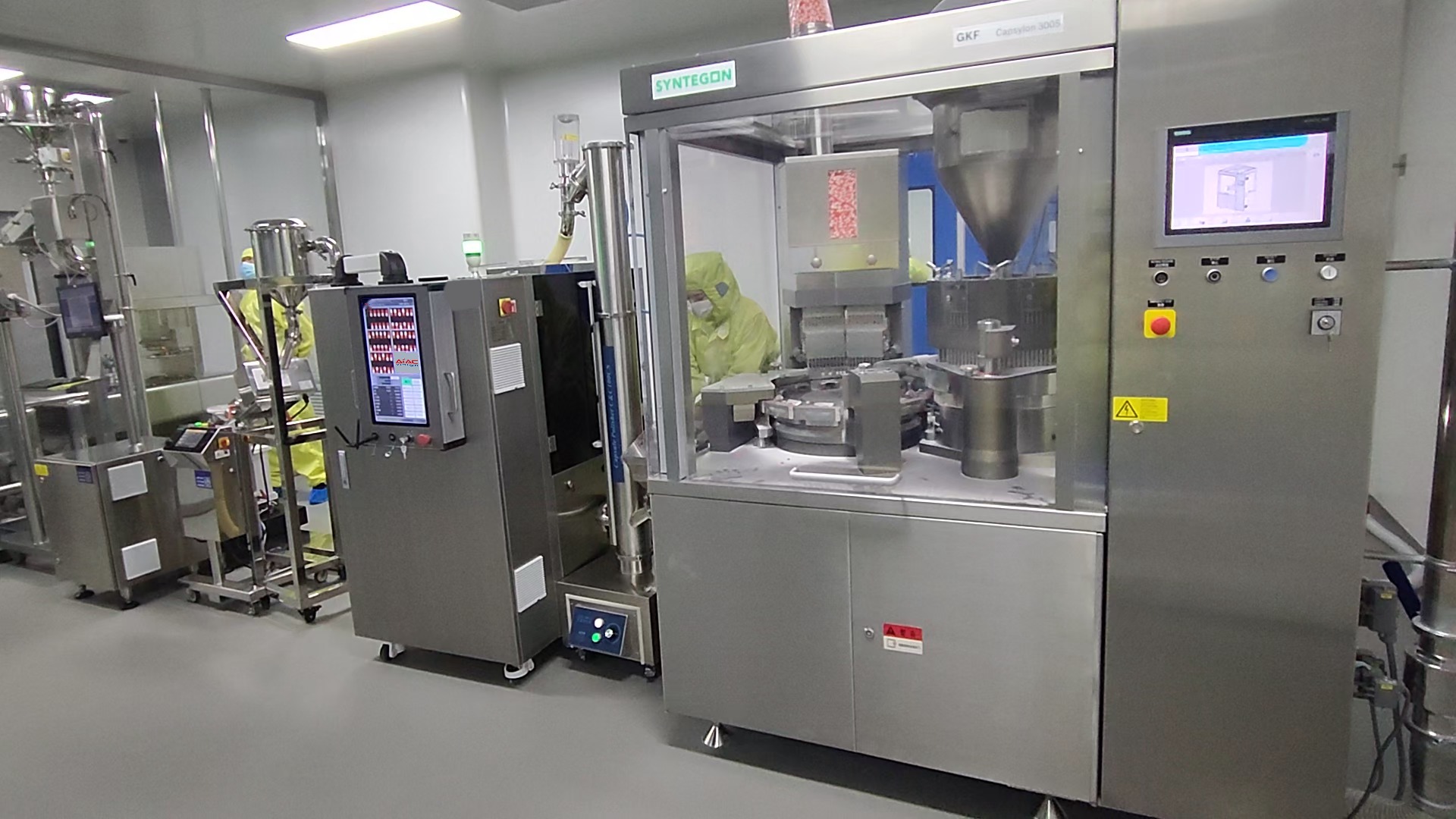 AIACVISION inspection equipment integrated with a Syntegon capsule filling line